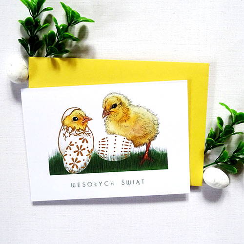 Ilustrowana Kartka Wielkanocna z Kurczątkami i ręcznie zdobionymi Pisankami wraz z napisem Wesołych Świąt.
